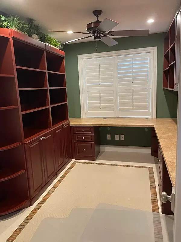 NEU-Spaces-Craft-Room-Before Dark and dated craft room before photo