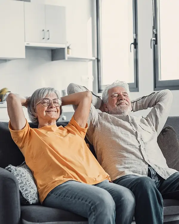 Older couple relaxing in their home